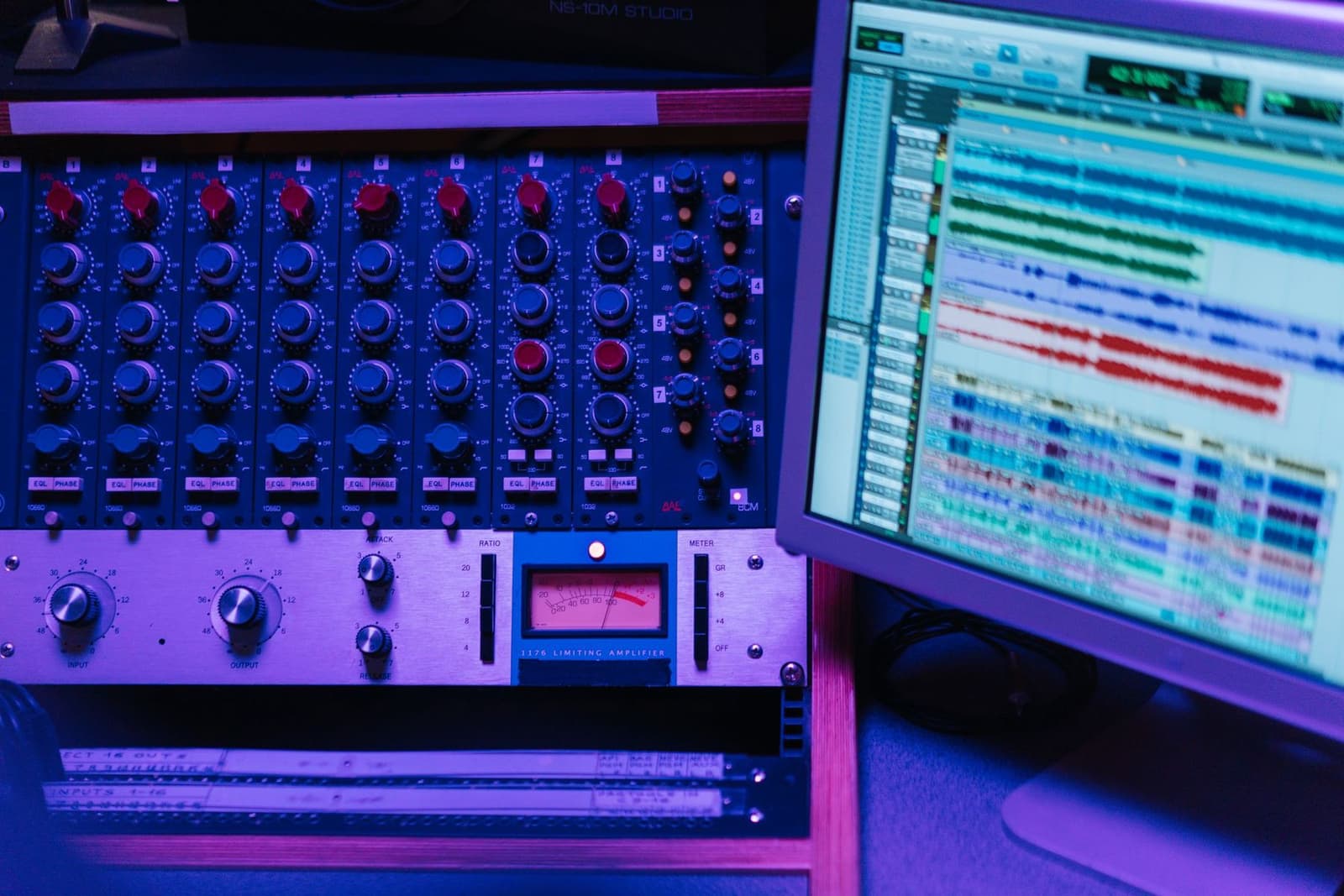 A close view of a studio mixing console